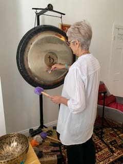Nila with a gong